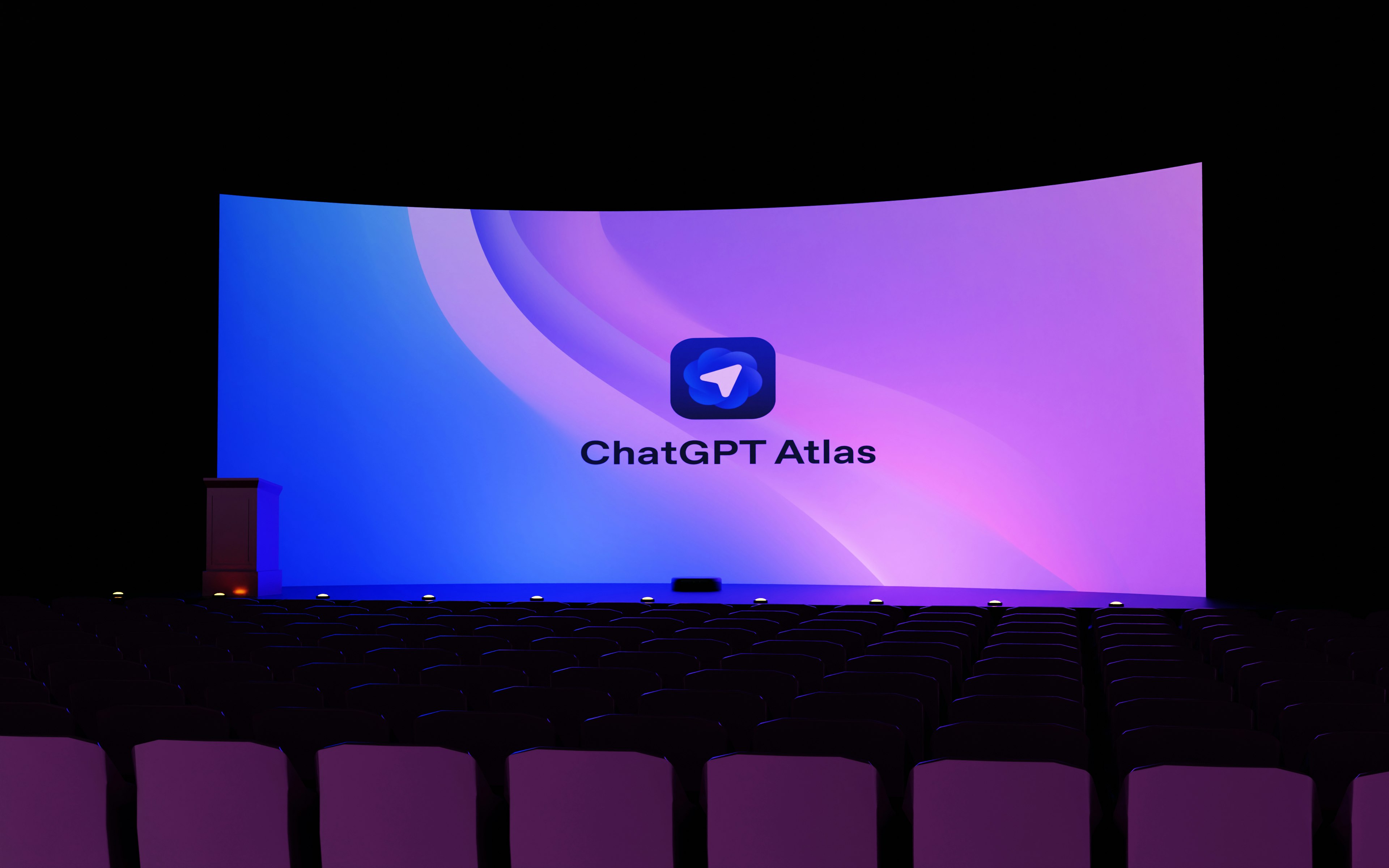 A large screen displays “chatgpt atlas” logo